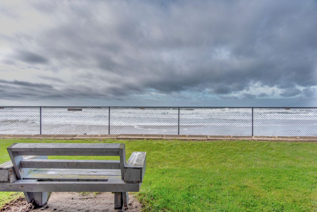 when is low tide in Lincoln City - stormy view from bench